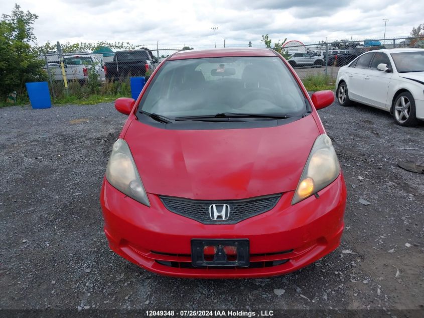 2009 Honda Fit Lx VIN: JHMGE88529S808672 Lot: 12049348