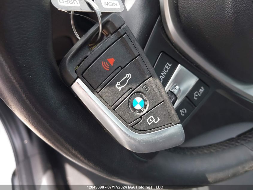 2021 BMW 3 Series VIN: 3MW5R7J06M8C10310 Lot: 12049398