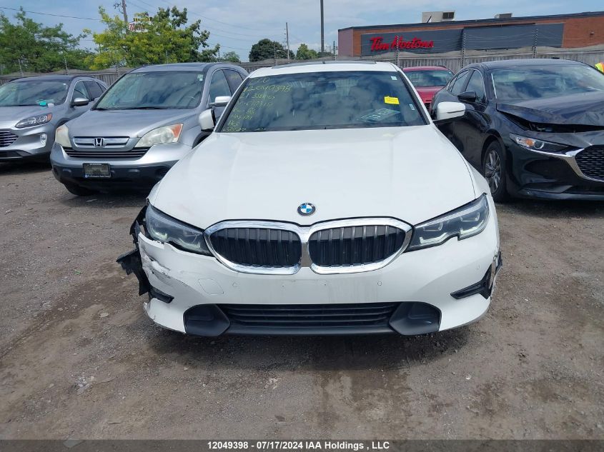 2021 BMW 3 Series VIN: 3MW5R7J06M8C10310 Lot: 12049398