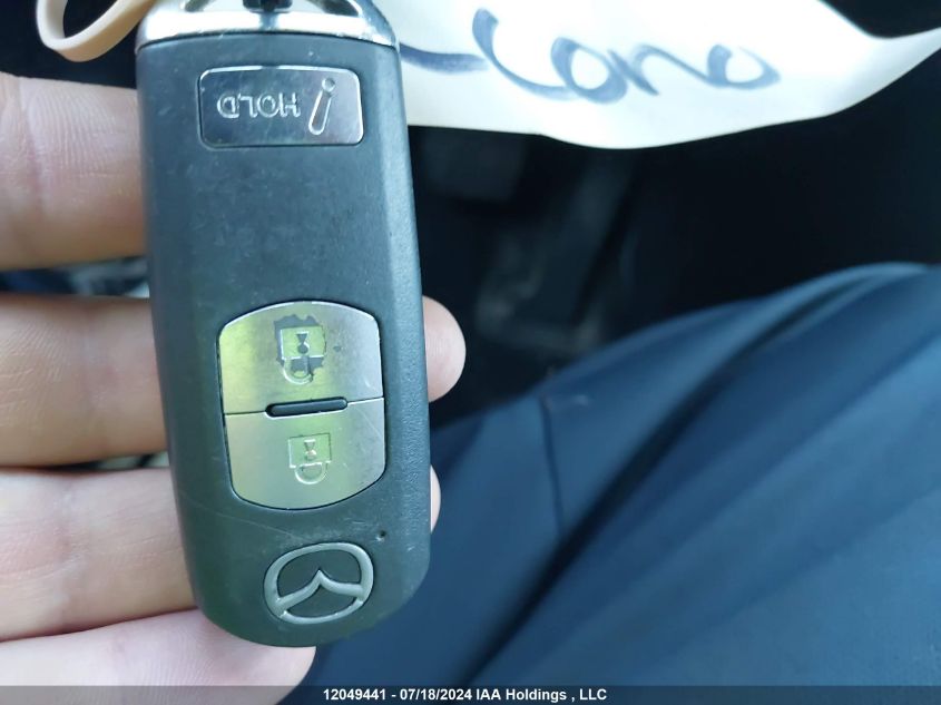 2014 Mazda Mazda3 VIN: JM1BM1L77E1180400 Lot: 12049441