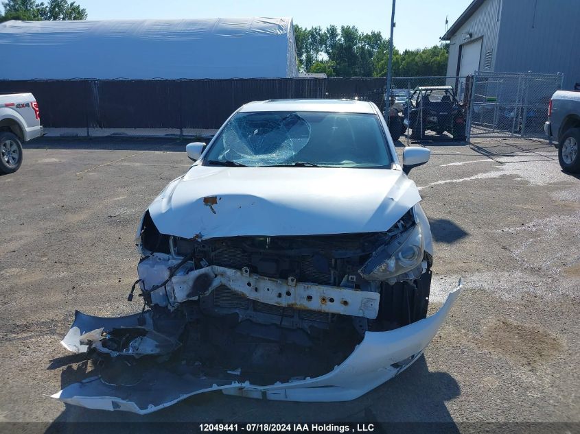 2014 Mazda Mazda3 VIN: JM1BM1L77E1180400 Lot: 12049441