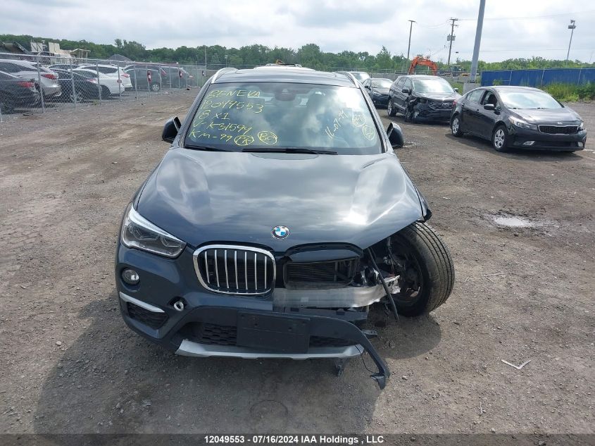 2018 BMW X1 xDrive28I VIN: WBXHT3C31J5K31594 Lot: 12049553