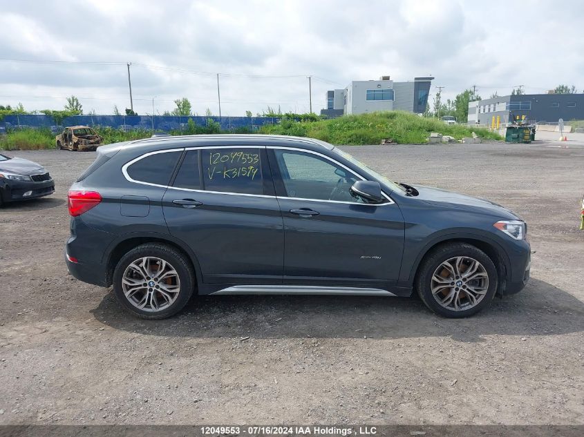 2018 BMW X1 xDrive28I VIN: WBXHT3C31J5K31594 Lot: 12049553