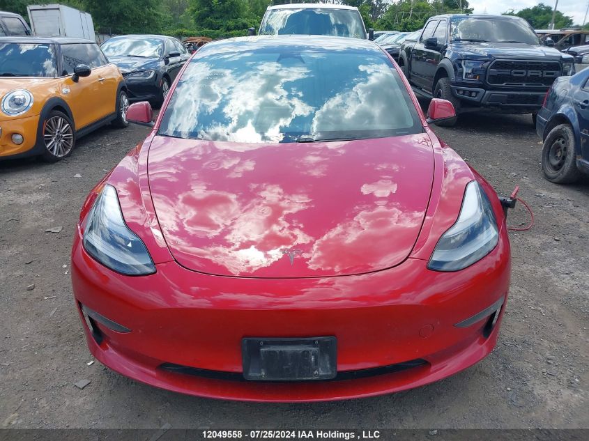 2021 Tesla Model 3 VIN: 5YJ3E1EB2MF979428 Lot: 12049558