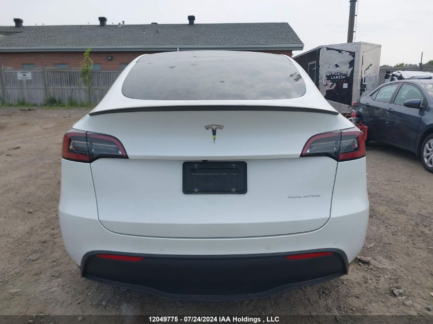 2022 Tesla Model Y VIN: 7SAYGDEEXNF428552 Lot: 12049775