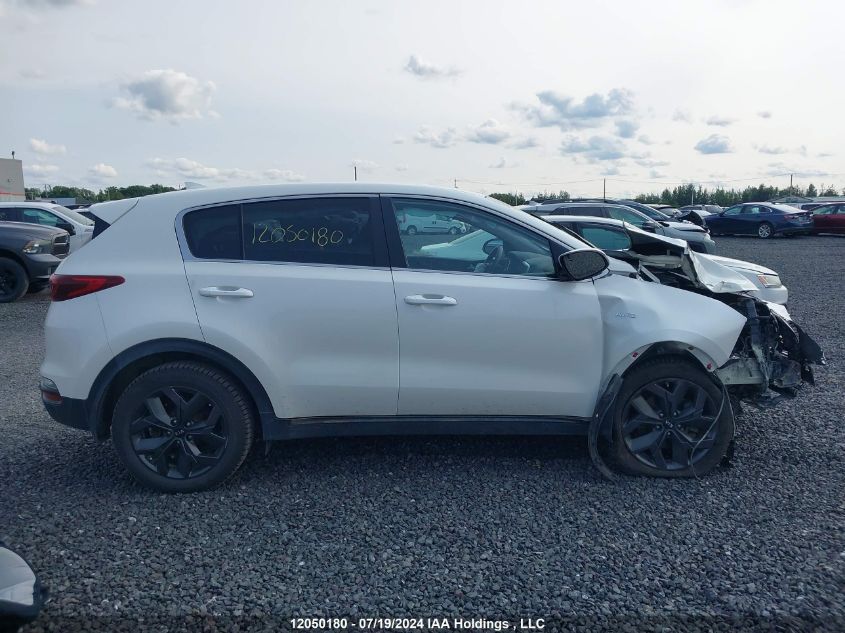 2021 Kia Sportage VIN: KNDPMCAC0M7870065 Lot: 12050180