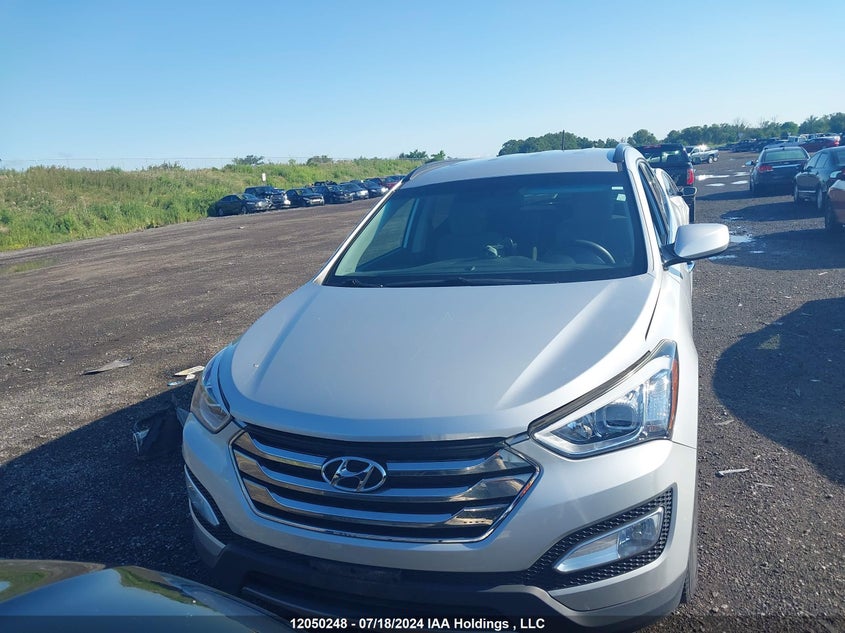 2014 Hyundai Santa Fe Sport 2.4 Base VIN: 5XYZT3LB2EG212624 Lot: 12050248