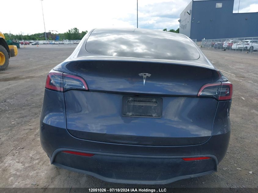 2023 Tesla Model Y VIN: LRWYGDFD0PC223094 Lot: 12051026