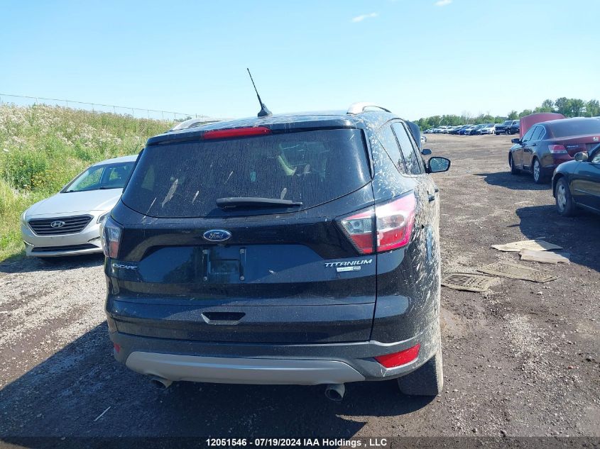 2018 Ford Escape Titanium VIN: 1FMCU9J96JUC41800 Lot: 12051546