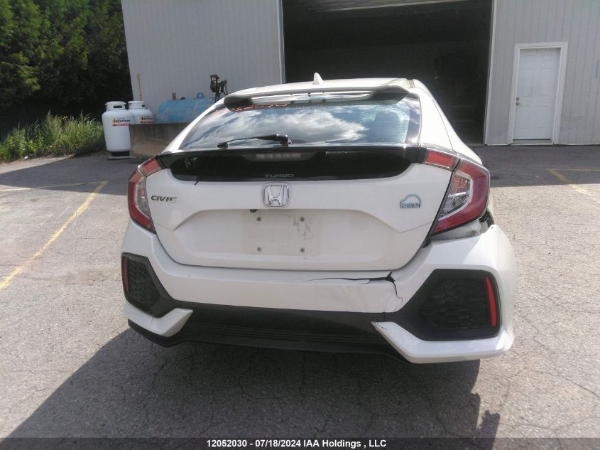 2018 Honda Civic Hatchback VIN: SHHFK7G20JU308534 Lot: 12052030