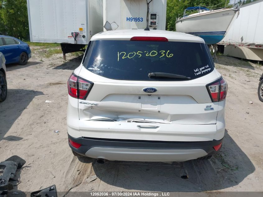 2017 Ford Escape Se VIN: 1FMCU9GD7HUE19512 Lot: 12052036