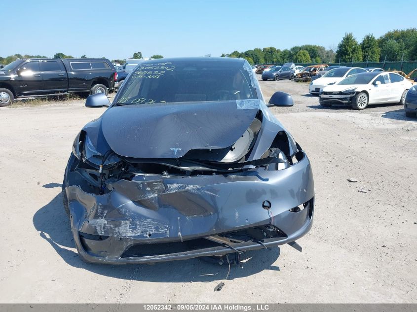 2022 Tesla Model Y VIN: 7SAYGDEF1NF565632 Lot: 12052342