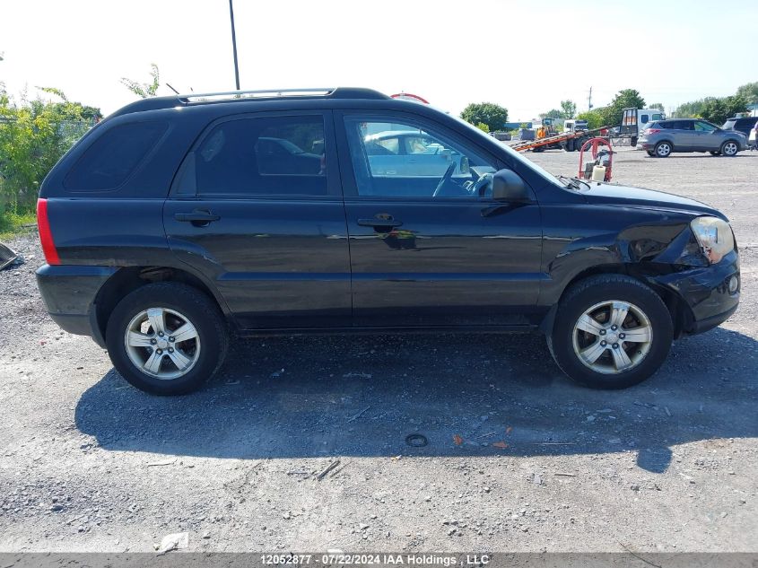 2009 Kia Sportage VIN: KNDJF722697619099 Lot: 12052877