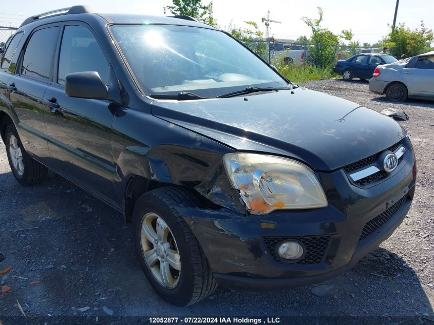 2009 Kia Sportage VIN: KNDJF722697619099 Lot: 12052877