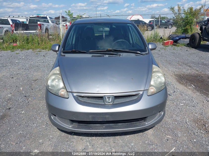 2007 Honda Fit VIN: JHMGD38477S818835 Lot: 12052880