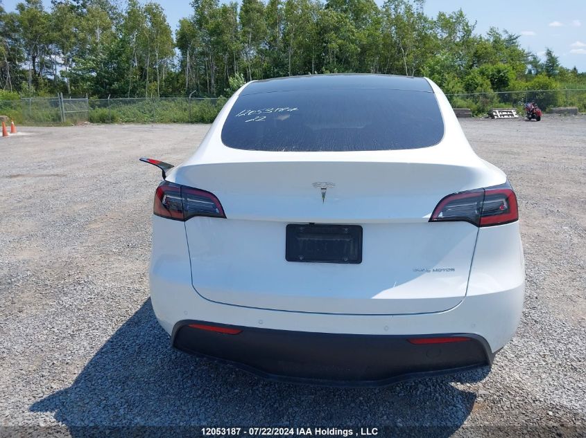 2022 Tesla Model Y VIN: 7SAYGDEE4NF338989 Lot: 12053187