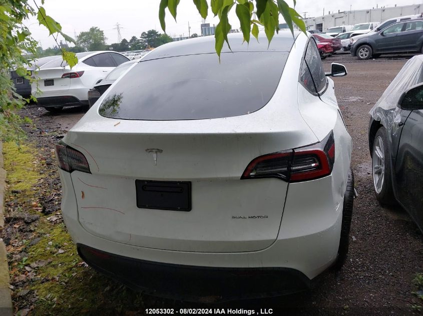 2022 Tesla Model Y VIN: 7SAYGDEE2NF513126 Lot: 12053302