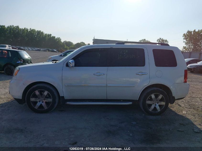 2014 Honda Pilot Touring VIN: 5FNYF4H93EB501209 Lot: 12053319