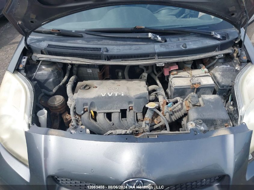 2009 Toyota Yaris VIN: JTDKT923X95262491 Lot: 12053455