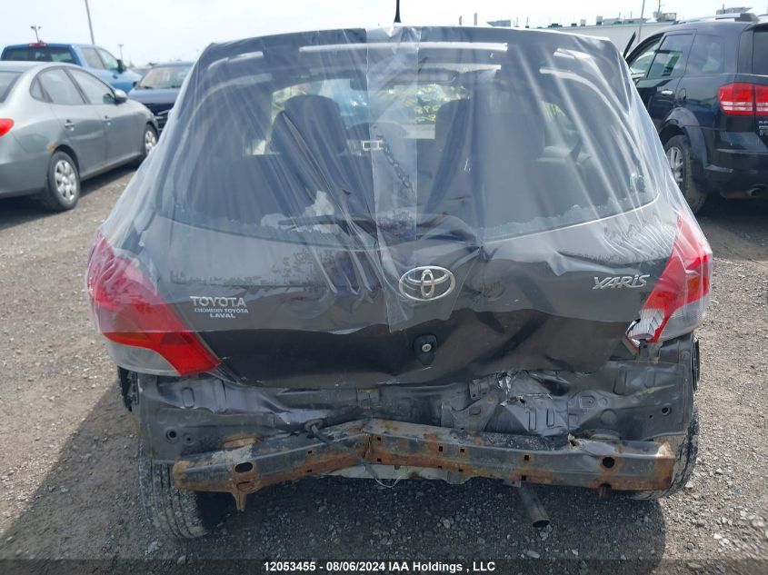 2009 Toyota Yaris VIN: JTDKT923X95262491 Lot: 12053455