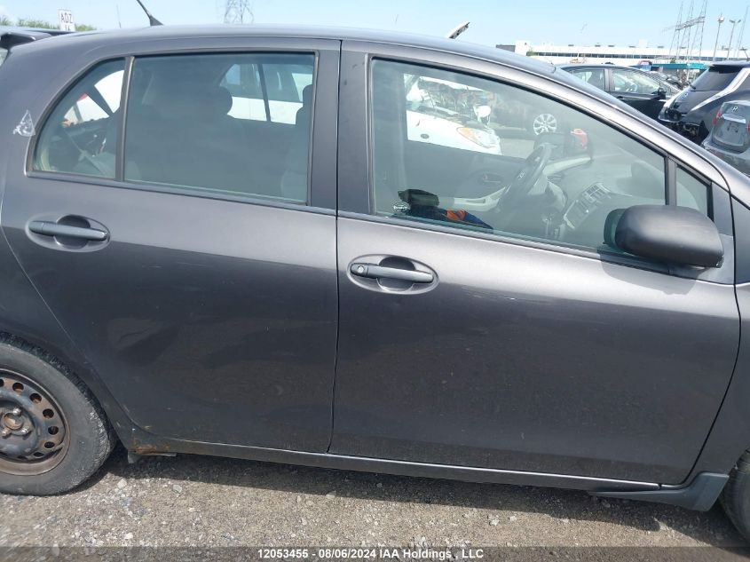 2009 Toyota Yaris VIN: JTDKT923X95262491 Lot: 12053455