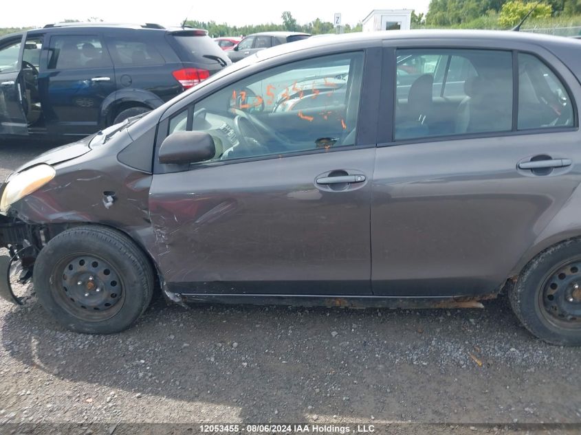 2009 Toyota Yaris VIN: JTDKT923X95262491 Lot: 12053455