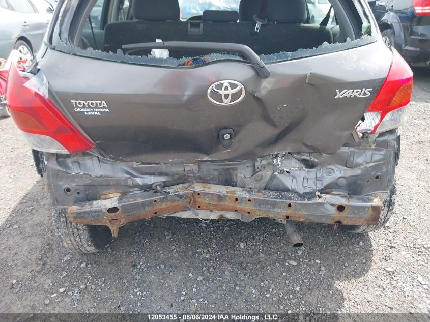 2009 Toyota Yaris VIN: JTDKT923X95262491 Lot: 12053455