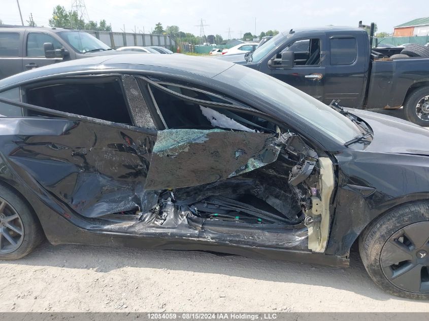 2021 Tesla Model 3 VIN: 5YJ3E1EA2MF920161 Lot: 12054059