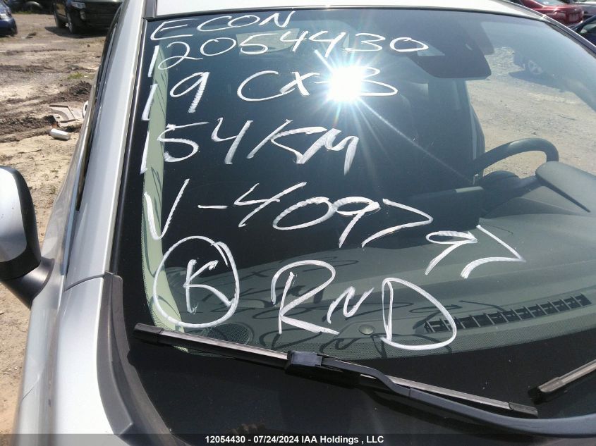 2019 Mazda Cx-3 Touring VIN: JM1DKFC72K1409797 Lot: 12054430