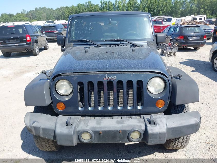 2007 Jeep Wrangler Unlimited Sahara VIN: 1J4GA59157L185282 Lot: 12055195