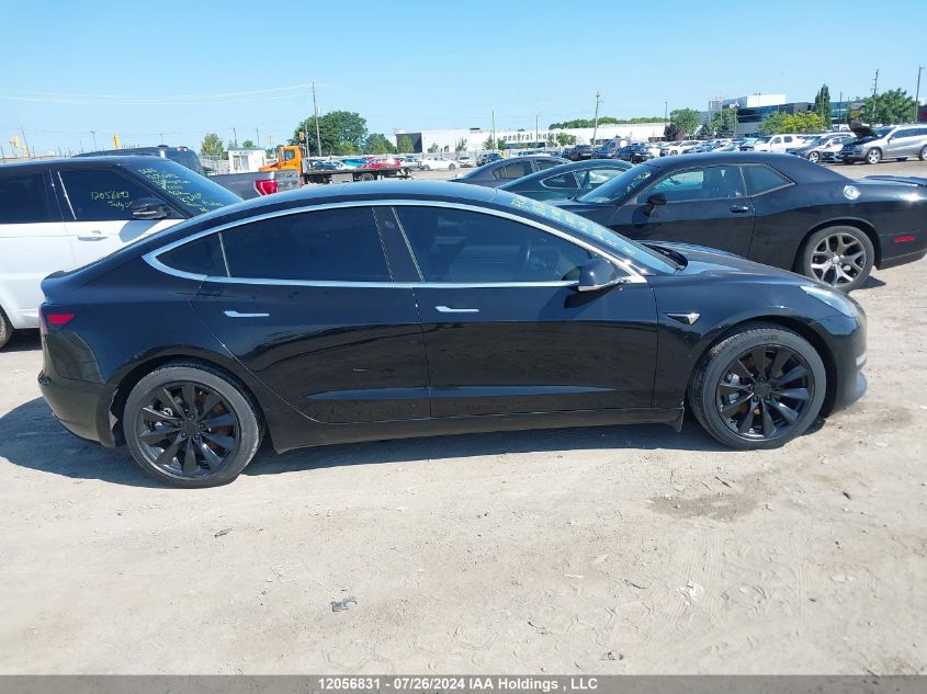 2019 Tesla Model 3 VIN: 5YJ3E1EAXKF414087 Lot: 12056831