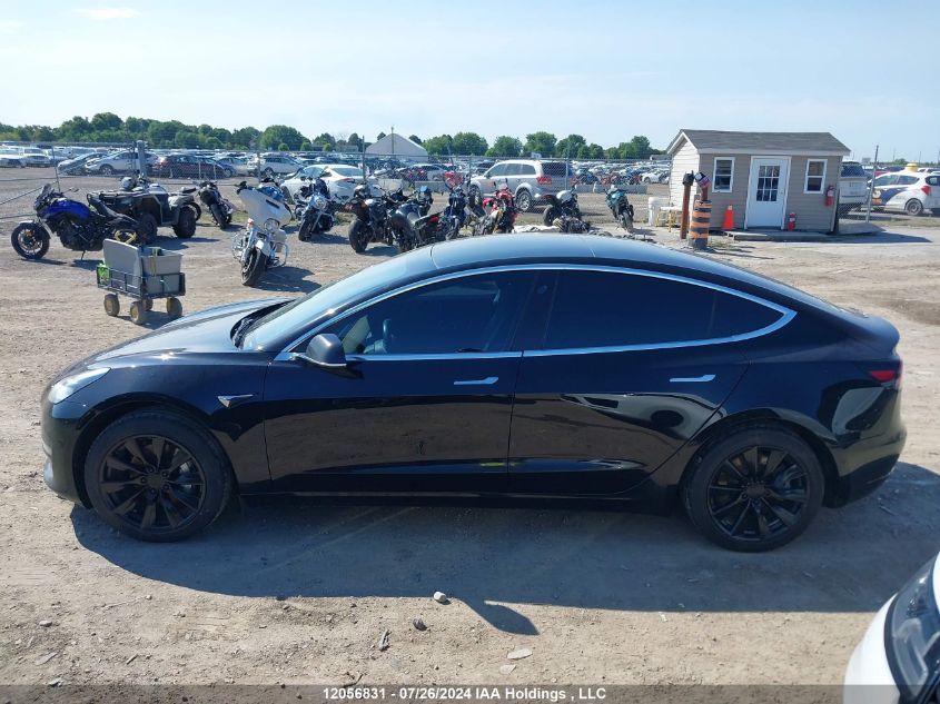 2019 Tesla Model 3 VIN: 5YJ3E1EAXKF414087 Lot: 12056831