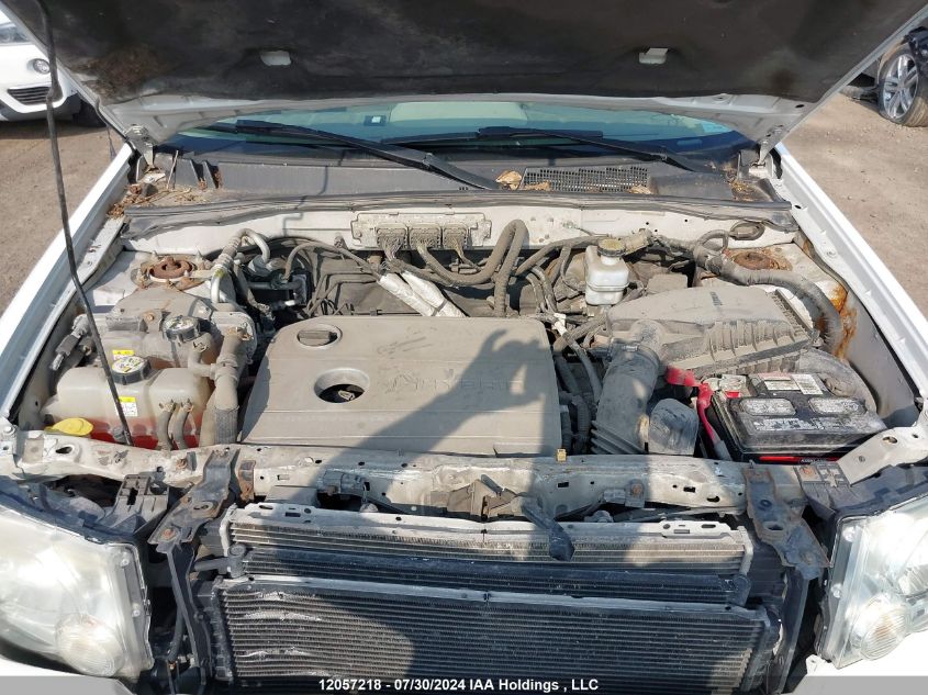 2010 Ford Escape Hybrid VIN: 1FMCU4K35AKA06605 Lot: 12057218