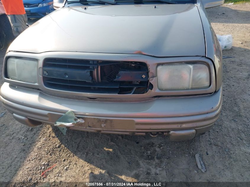 2003 Chevrolet Tracker VIN: 2CNBJ634736938723 Lot: 12057556