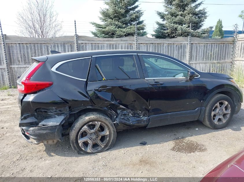 2018 Honda Cr-V VIN: 2HKRW2H5XJH118689 Lot: 12058353