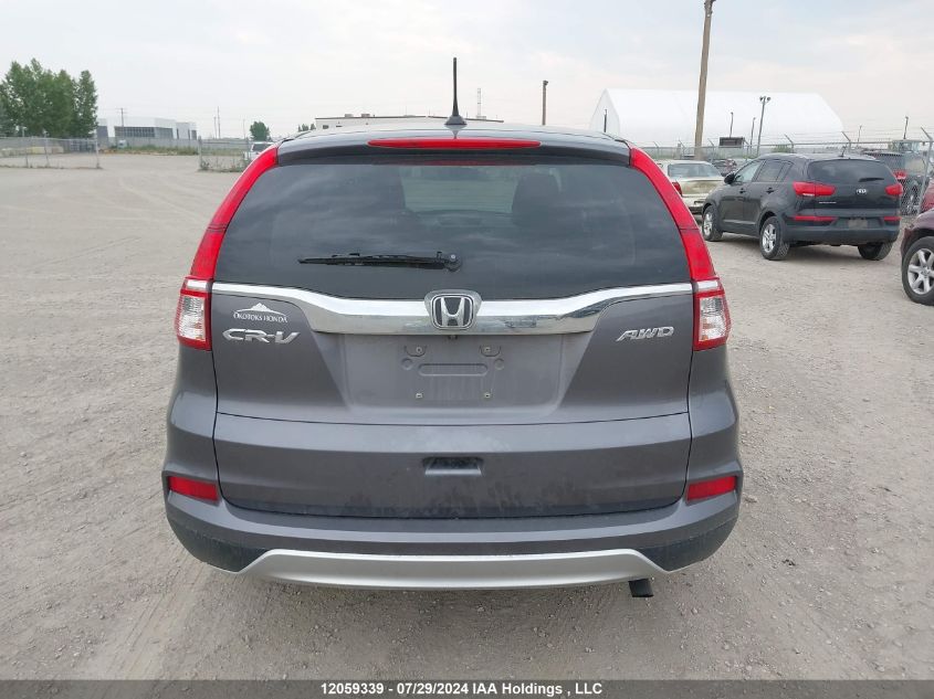 2015 Honda Cr-V VIN: 2HKRM4H77FH103108 Lot: 12059339