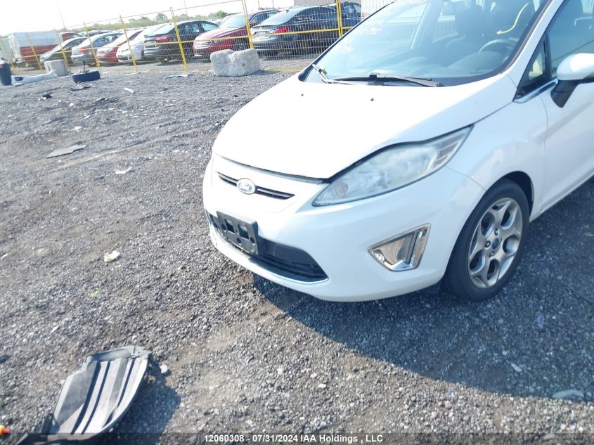 2011 Ford Fiesta Ses VIN: 3FADP4FJ4BM160795 Lot: 12060308