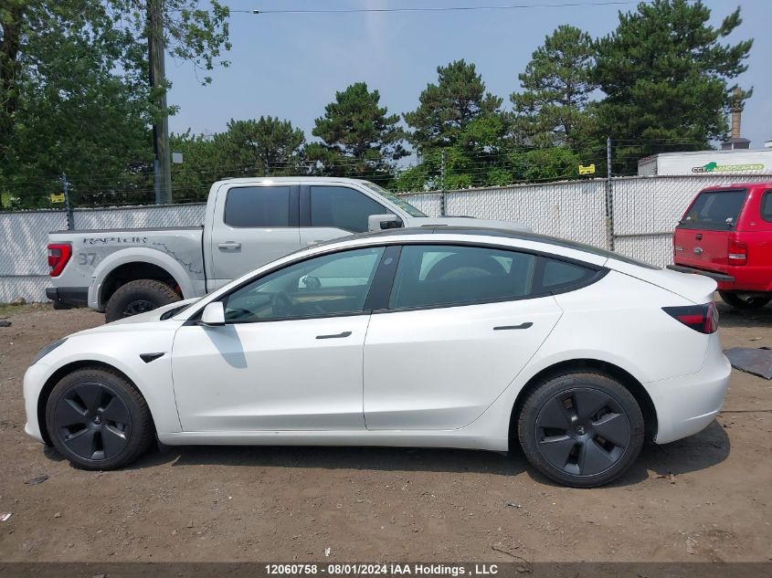 2022 Tesla Model 3 VIN: 5YJ3E1EB6NF206043 Lot: 12060758