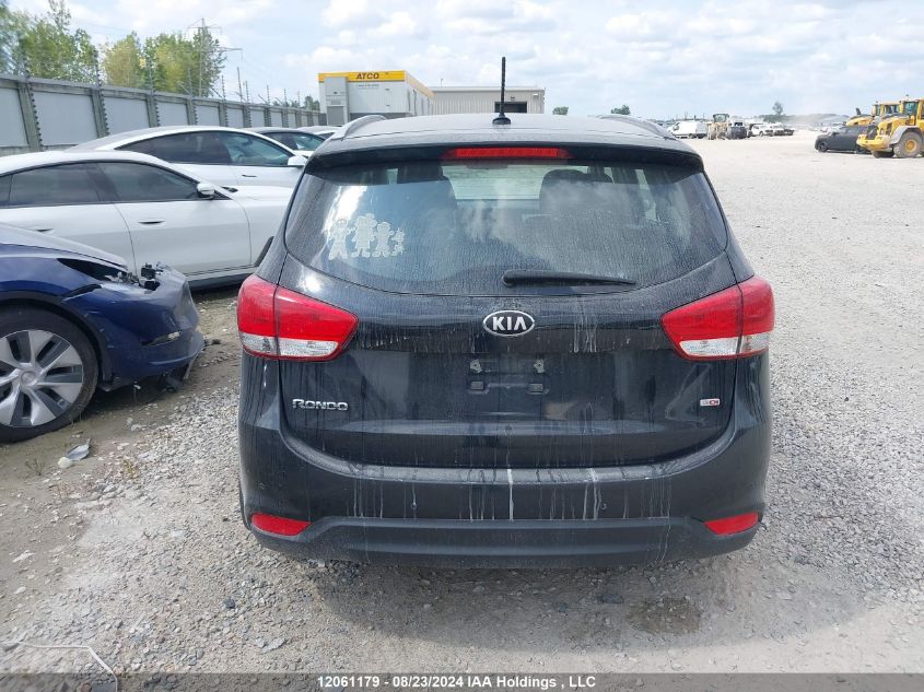 2014 Kia Rondo VIN: KNAHT8A39E7012130 Lot: 12061179