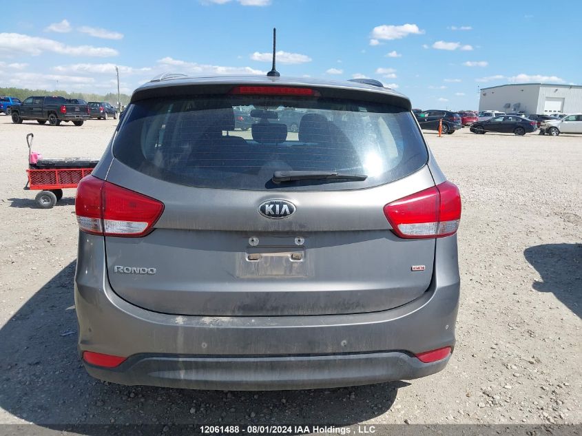 2014 Kia Rondo VIN: KNAHT8A31E7060379 Lot: 12061488