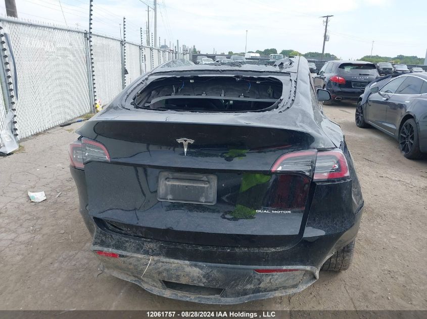 2023 Tesla Model Y VIN: 7SAYGDEE8PF781942 Lot: 12061757