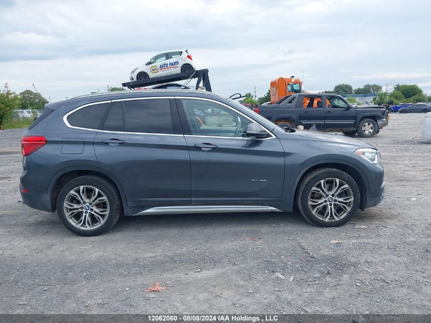 2018 BMW X1 VIN: WBXHT3C37J5F91357 Lot: 12062060