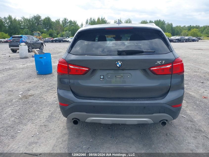 2018 BMW X1 VIN: WBXHT3C37J5F91357 Lot: 12062060