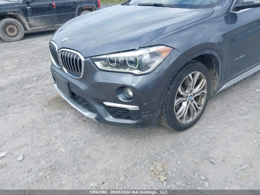 2018 BMW X1 VIN: WBXHT3C37J5F91357 Lot: 12062060