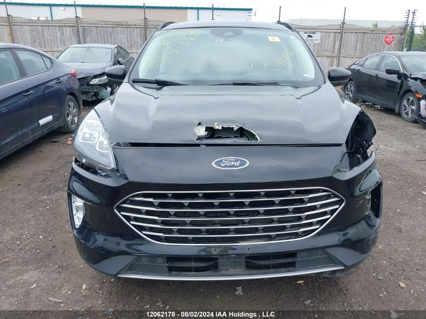 2021 Ford Escape Titanium Hybrid VIN: 1FMCU9DZ4MUA45046 Lot: 12062178