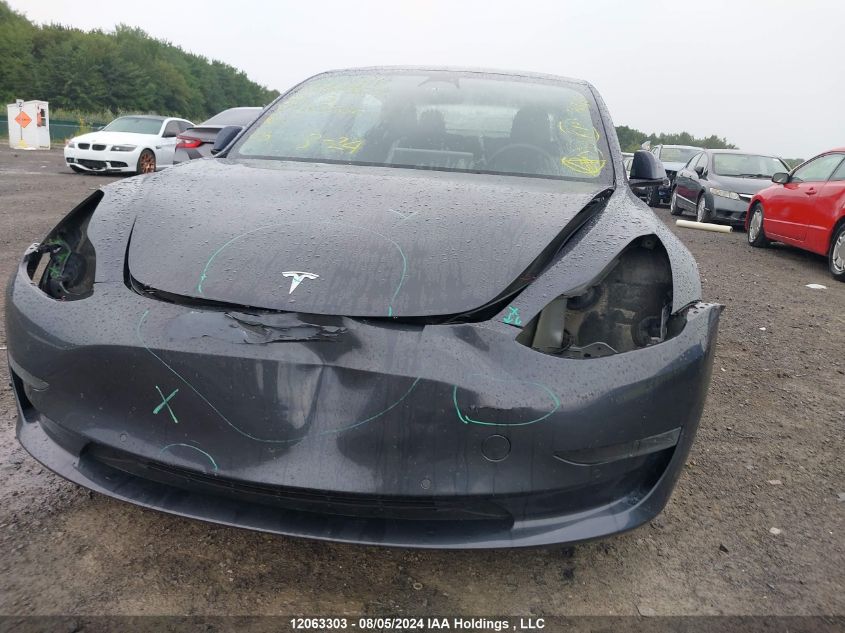 2022 Tesla Model 3 VIN: 5YJ3E1EA7NF167051 Lot: 12063303