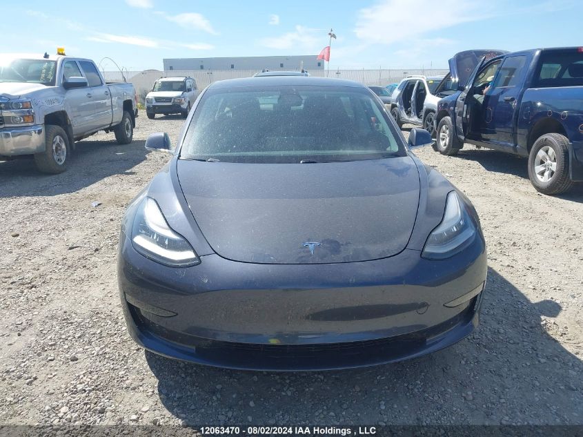 2019 Tesla Model 3 VIN: 5YJ3E1EB6KF495694 Lot: 12063470