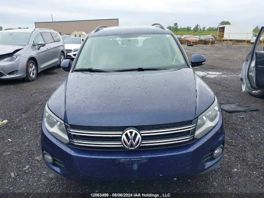 2015 Volkswagen Tiguan VIN: WVGJV7AX6FW556082 Lot: 12063499