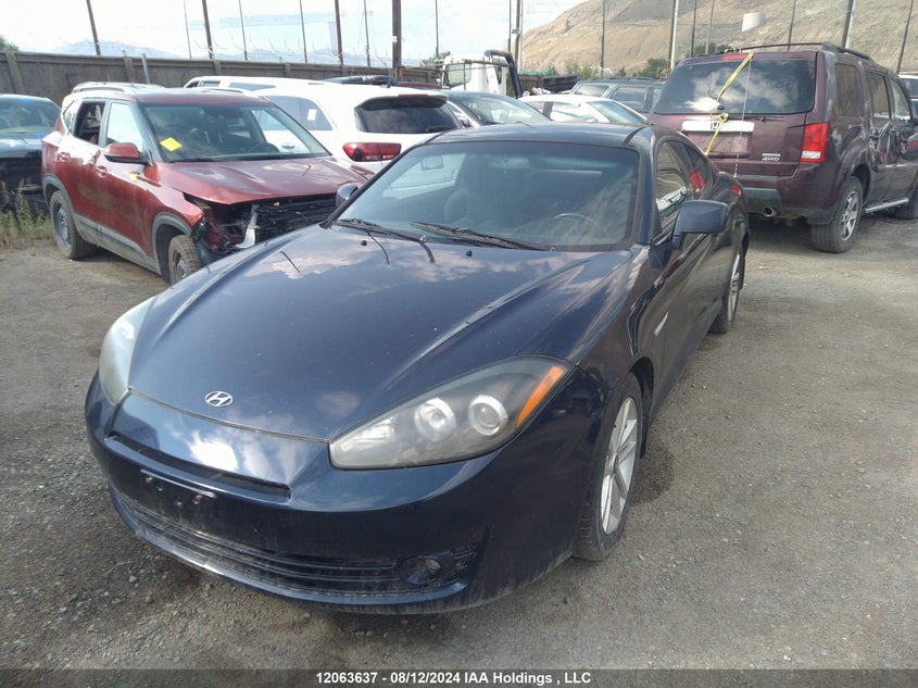 2008 Hyundai Tiburon Gs VIN: KMHHM65D98U296822 Lot: 12063637