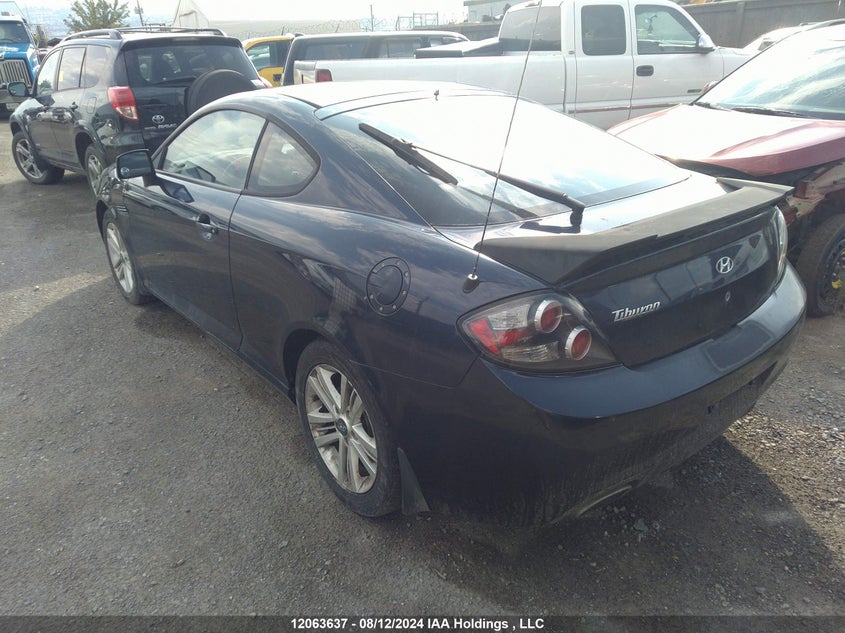 2008 Hyundai Tiburon Gs VIN: KMHHM65D98U296822 Lot: 12063637